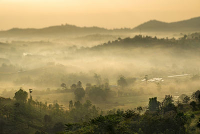 Scenic view of mountains against sky during sunset