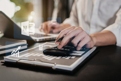 Man using laptop on table