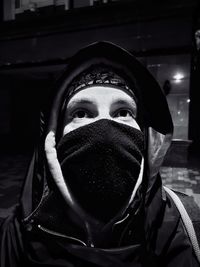 Close-up portrait of man wearing mask