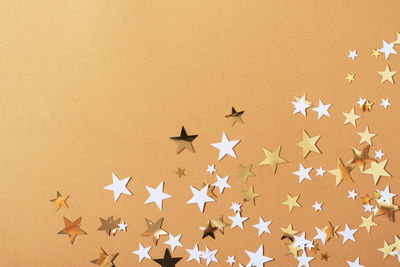 High angle view of colored pencils on paper