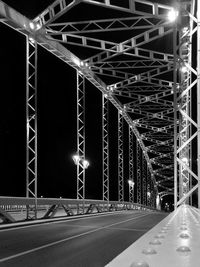 View of illuminated bridge at night