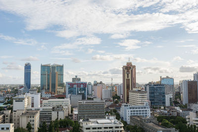 Modern buildings in city against sky