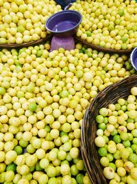 High angle view of lemons for sale in market