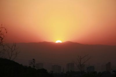 Scenic view of mountains at sunset