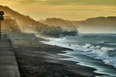 Scenic view of sea against sky during sunrise