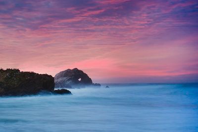 Scenic view of sea at sunset