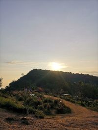 Scenic view of landscape against sky during sunset