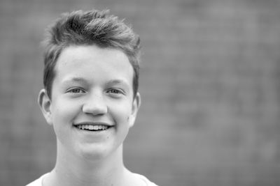 Close-up portrait of smiling boy