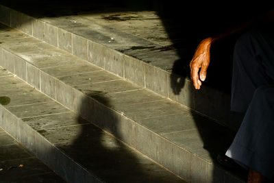 High angle view of man standing on steps