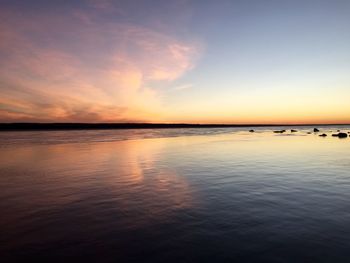 Scenic view of sea at sunset