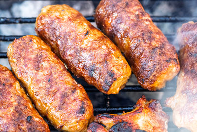 Close-up of meat on barbecue grill