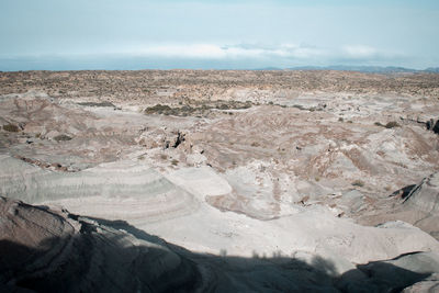 Scenic view of desert against sky