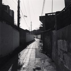 Narrow alley along buildings