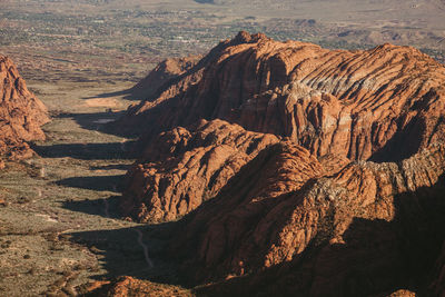 Cliffs snow canyon state park with st. george utah in the background