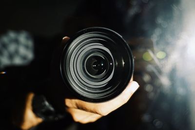 Close-up of hand holding camera