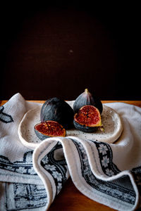 Close-up of fruits in bowl on table