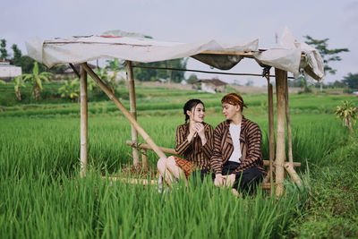 Young couple kissing on land