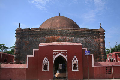 Exterior of historic building against sky