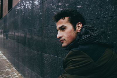 Close-up of young man looking away