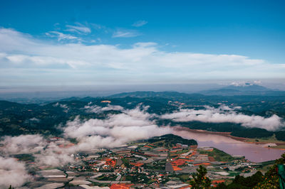 Aerial view of townscape against sky