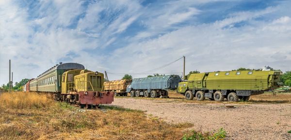 Train on field against sky