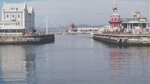 Boats moored at harbor