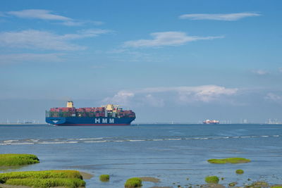 Ship in sea against sky