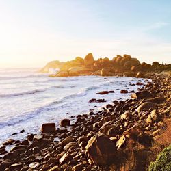 Scenic view of sea against sky during sunset