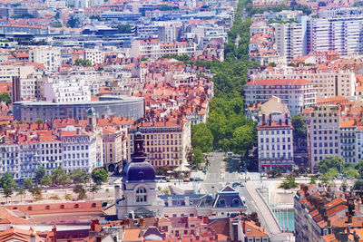 High angle view of street and buildings in city