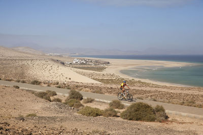 Spain, canary islands, fuerteventura, senior man on mountainbike