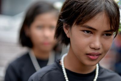 Close-up of girl looking away during festival