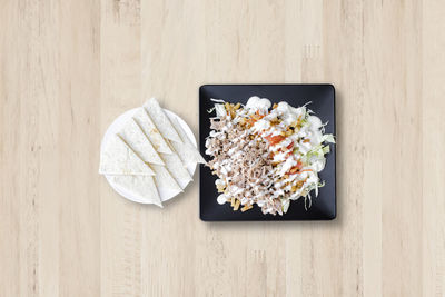 Directly above shot of ice cream in plate on table