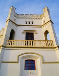 Low angle view of building against blue sky