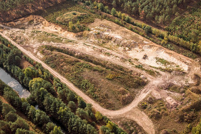 High angle view of road amidst trees