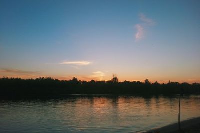 Scenic view of sunset over river