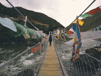 Panoramic view of flags hanging on mountain