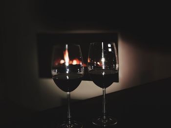 Close-up of wine glasses on table