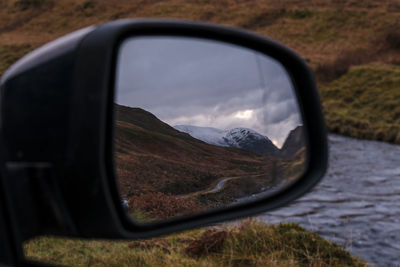 Reflection on side-view mirror