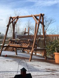 Playground in park against sky