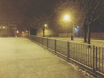 Illuminated street lights at night