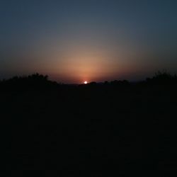 Silhouette of landscape at sunset