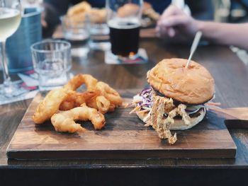 Close-up of fast food served on table