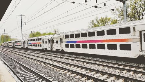 Train on railroad station platform against sky