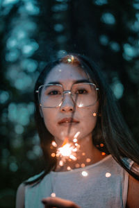 Portrait of woman with illuminated hair