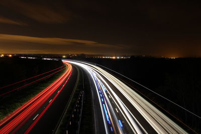 Light trails on road at night