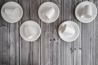 High angle view of empty coffee cups on table