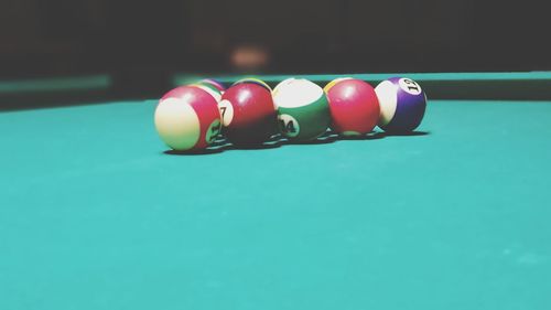 Close-up of multi colored balls on table