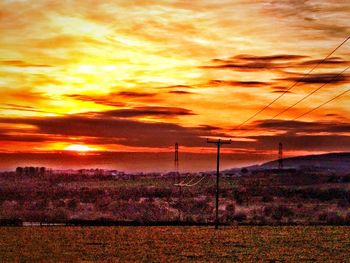 Scenic view of landscape against sky during sunset