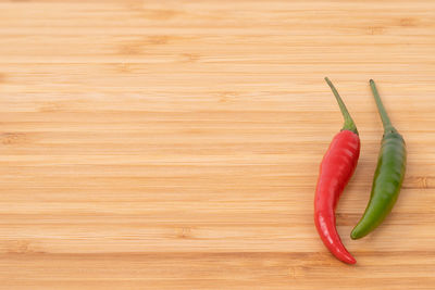 High angle view of chili peppers on table