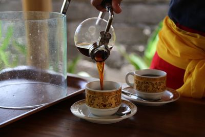 Close-up of coffee cup on table